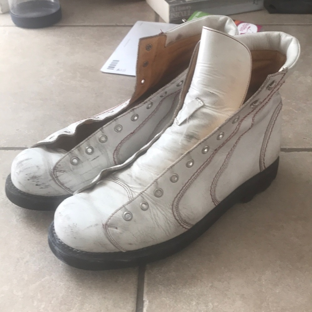 John Fluevog combat boots. Well loved but plenty of life left. Made in Poland.